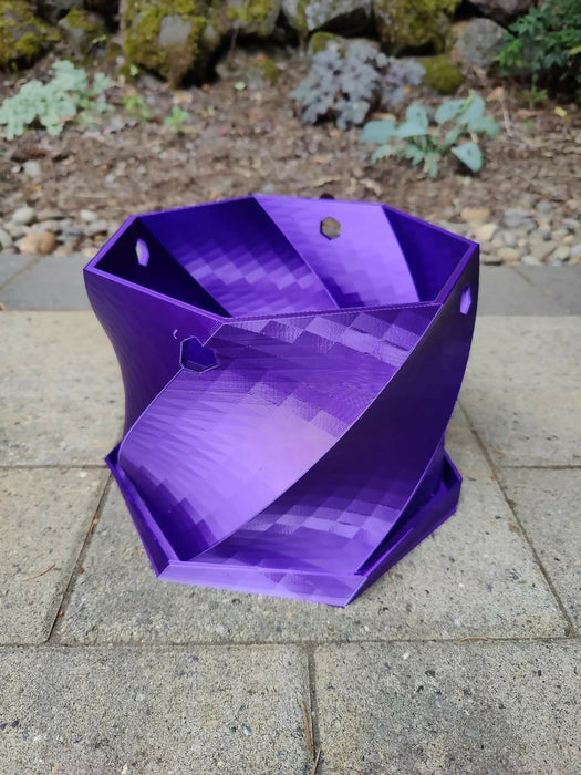 Twisted Elegance: The Hanging Planter with integrated drainage