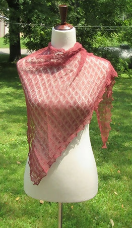 rust brown fine lace shawl with diamon/leaf motif on white dress form