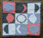 Photograph of the green, pink, and grey tarot cloth without anything on it.