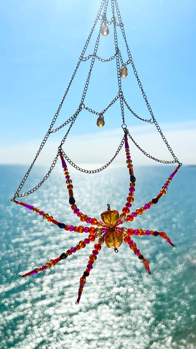 Sunset Spell Web – Beaded Spider Suncatcher
