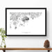 Map wall decor in a black frame. Contour lines of Acadia National Park are drawn on a white background. Text  below the map can be customized to create custom adventure art.