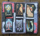Photograph of the green, pink, and grey tarot cloth with six tarot cards on it.