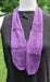 a purple scarf with a lace heart motif on a dress form