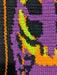 Close-up photograph of the pattern sample, focused on the ribcage.