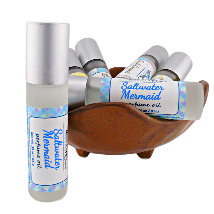 saltwater mermaid perfume roll on bottle, ocean scent with sea salt, watery greens