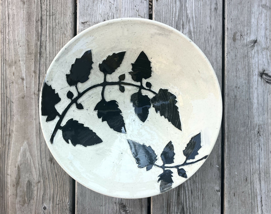 large tomato vine serving bowl with fluted edge