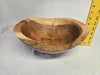 A picture of a wooden cherry bowl with a ruler next to it measuring 4-3/4 inches
