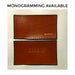 Title: "monogramming available". Shows two leather grips in honey with one customer's initials on one grip, debossed with alphabet stamps for personalization. 