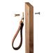 Animated GIF image of installing the hardware of the Burnside hinged leather handle with hardware, on a template wood cabinet door. The hardware uses a surfaceless head Chicago screw on the front side of the cabinet and a threaded back screw to secure it to the door. 