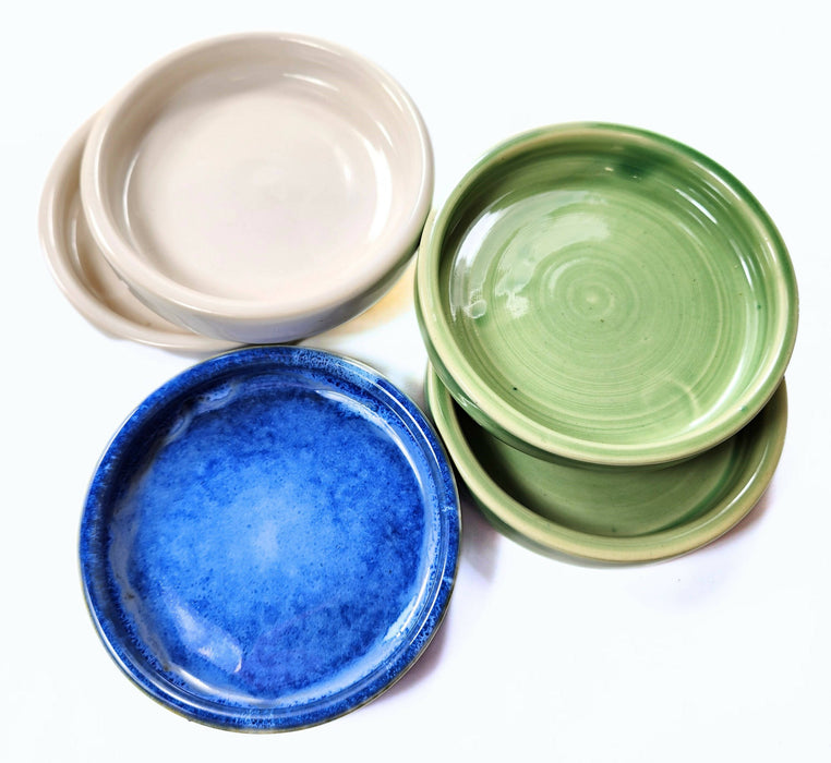 pottery wine bottle coaster or ceramic cat food dish