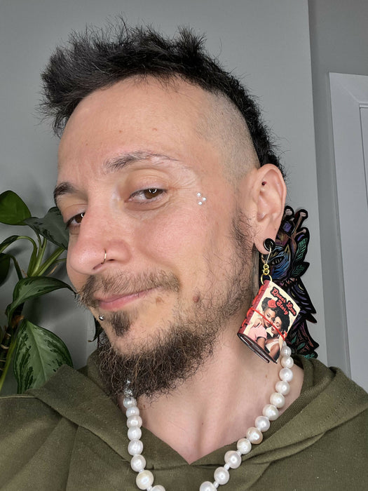 Beautifully handmade and hand sewn sustainable cork earrings featuring queer love stories of 50's inspired queer women.