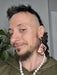 Beautifully handmade and hand sewn sustainable cork earrings featuring queer love stories of 50's inspired queer women.