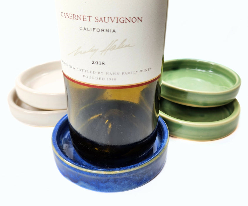 pottery wine bottle coaster or ceramic cat food dish