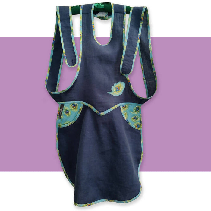 Vintage 50s linen apron in navy linen with peacock feathers accents