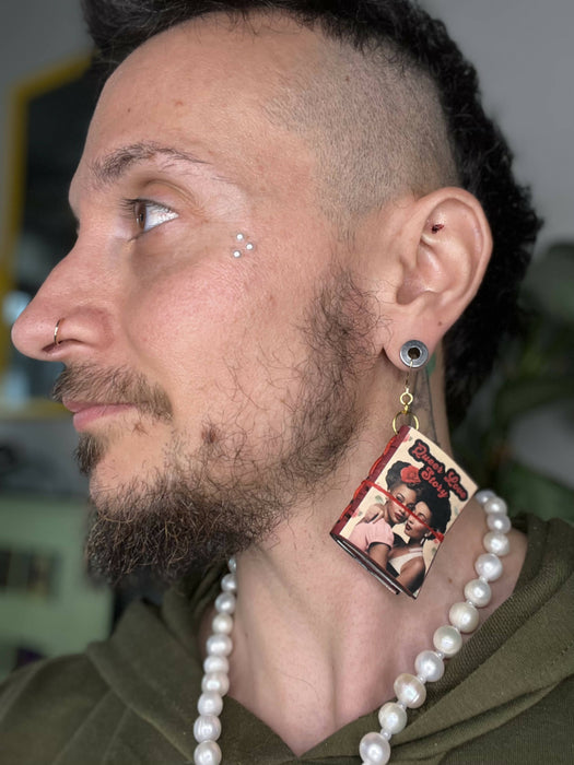 Beautifully handmade and hand sewn sustainable cork earrings featuring queer love stories of 50's inspired queer women.
